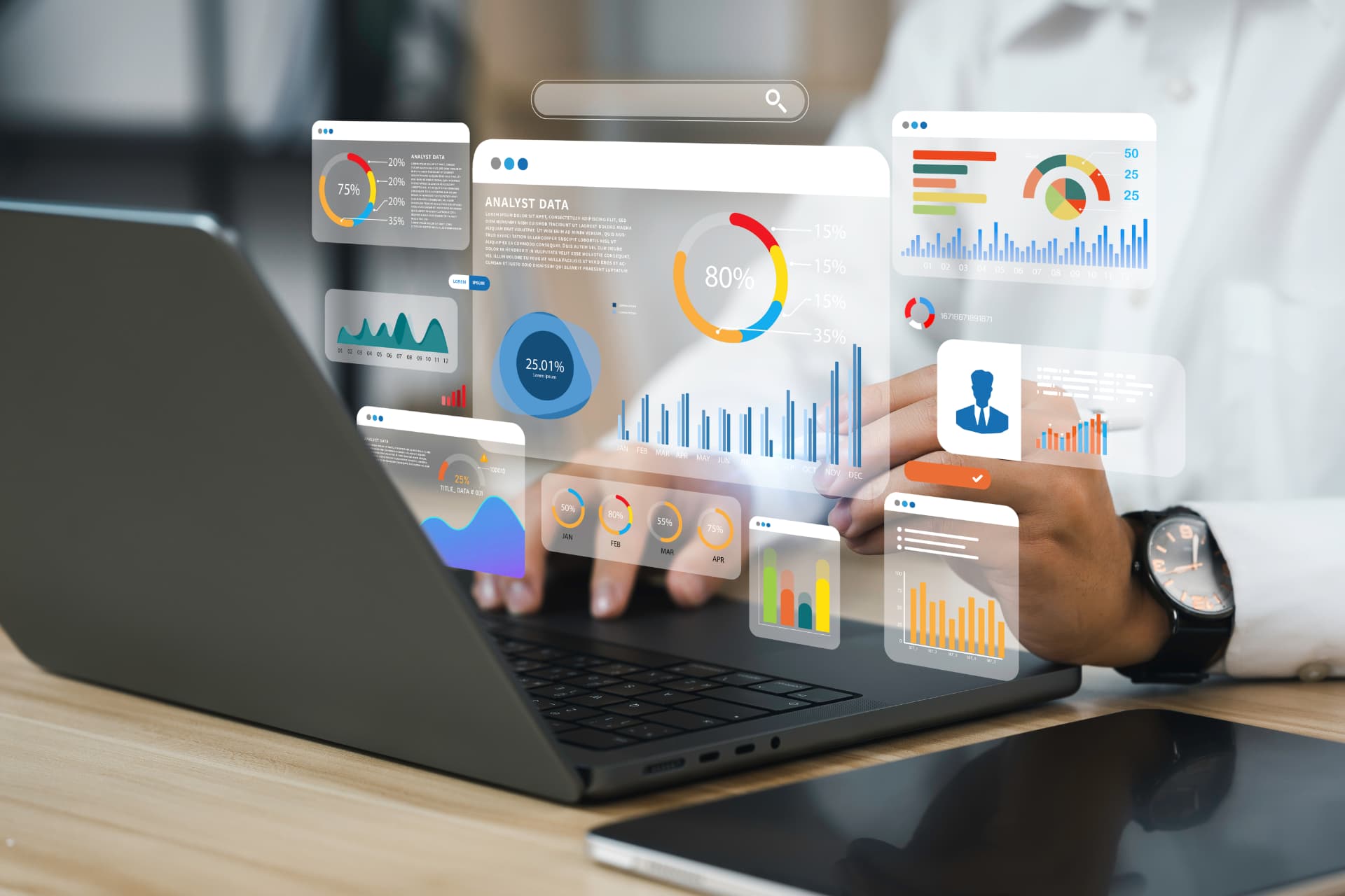 Analytics dashboards floating above a laptop
